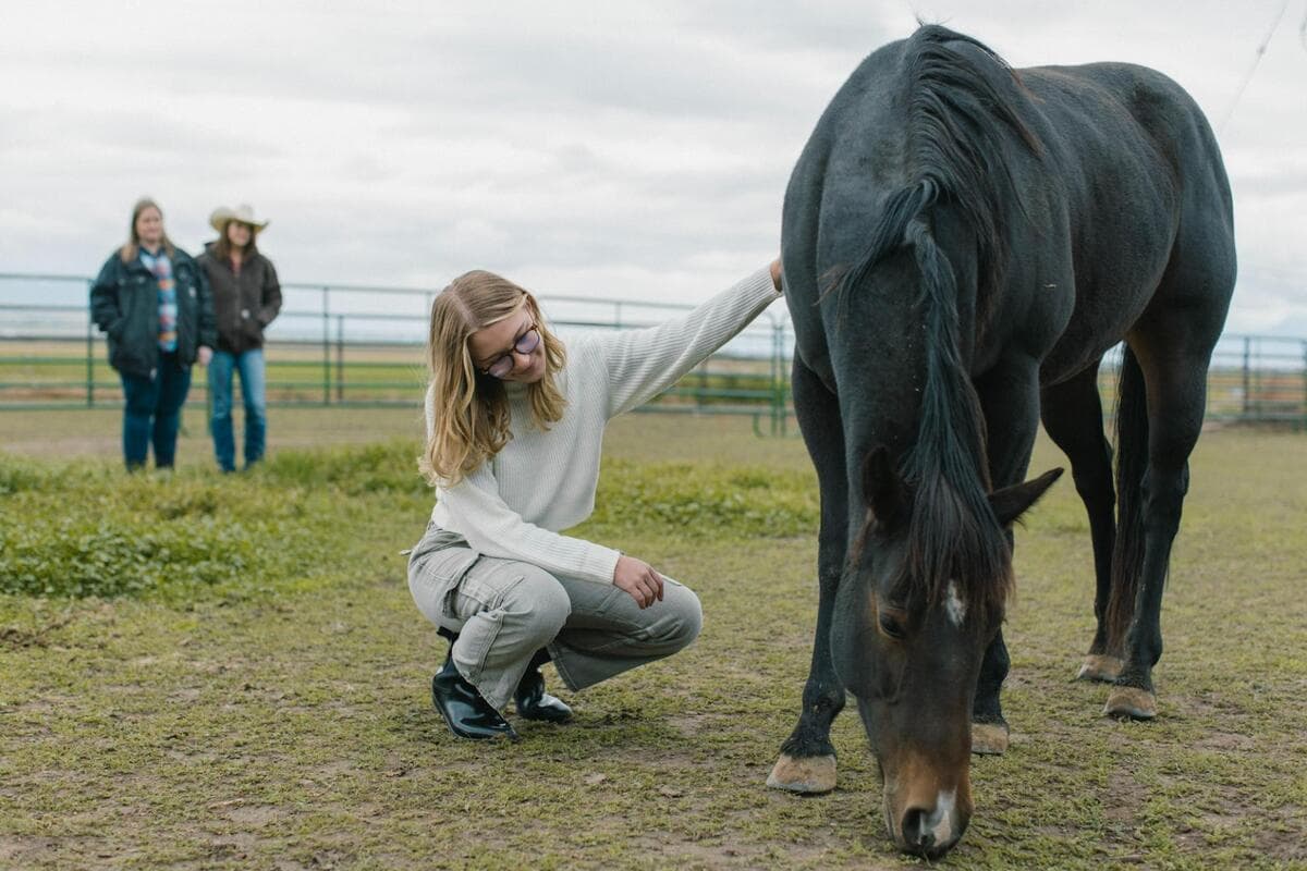 Teen girl with horse at equine therapy — Juniper Haven