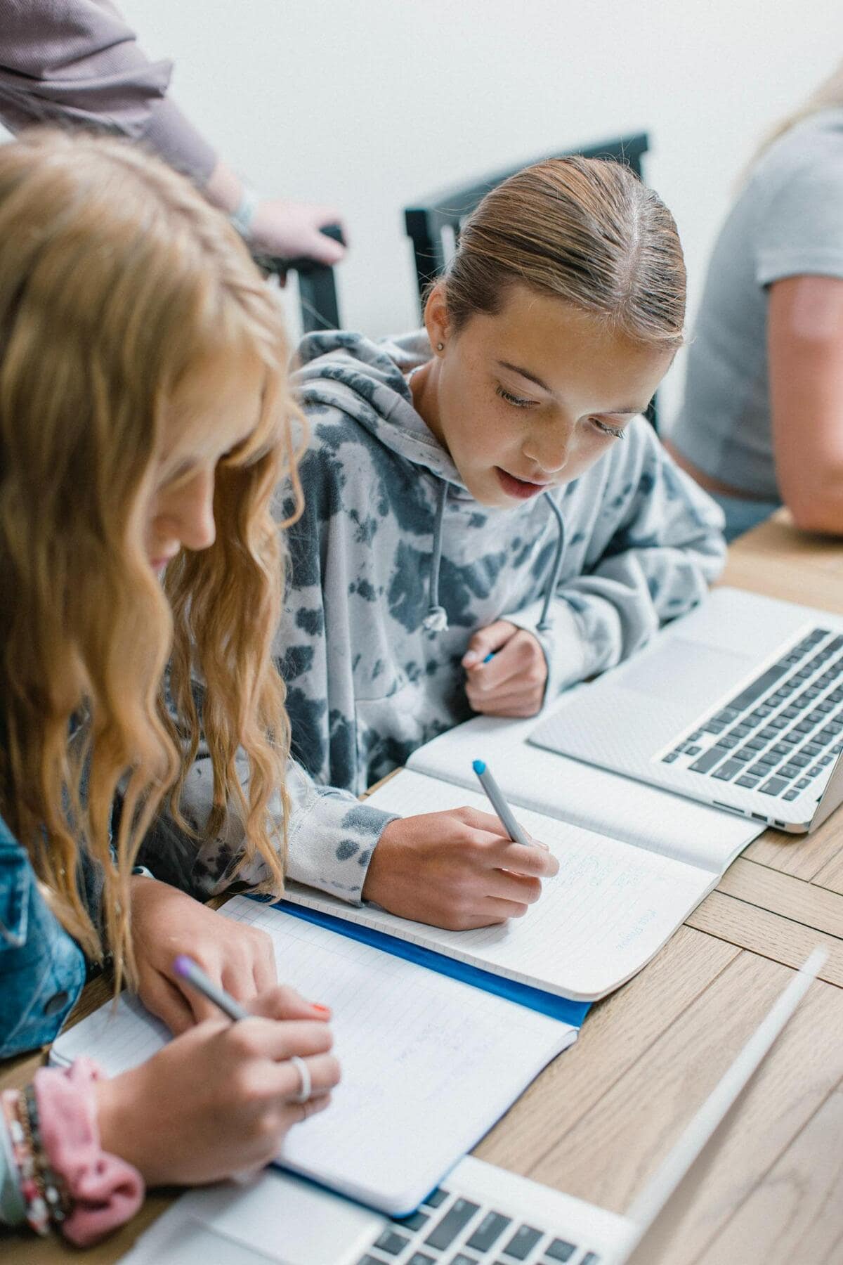 Teen girls working on academics at Juniper Haven